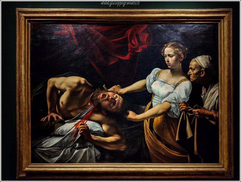 Michelangelo Merisi da Caravaggio 
"Giuditta decapita Oloferne"