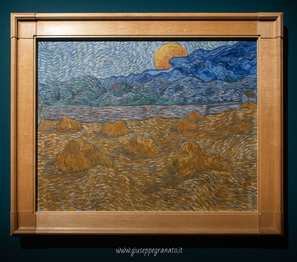 V. van Gogh, Paesaggio con covoni e luna nascente, 1889