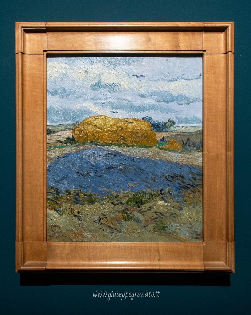 V. van Gogh, Covone sotto un cielo nuvoloso, 1890