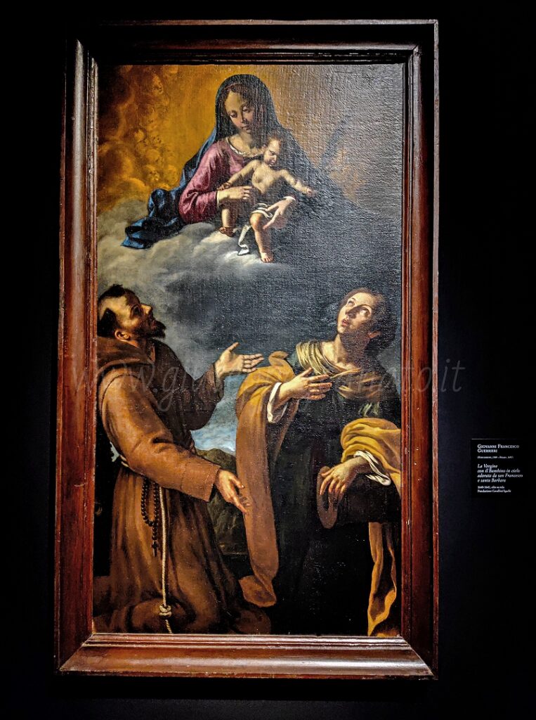Giovanni Francesco Guerrieri, "La Vergine col Bambino in cielo adorata da San Francesco e Santa Barbara", 1640