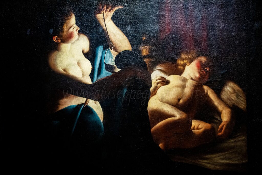 Trophi,e Bigot, "Cupido svegliato da Psiche", 1620 ca, olio su tela, 90 x 126 cm, Teramo, Pinacoteca Civica